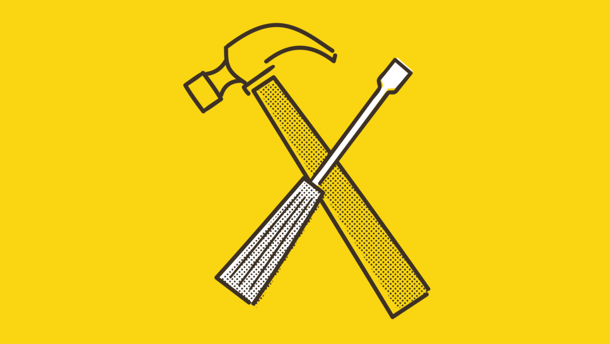 drawing of a hammer and a spanner