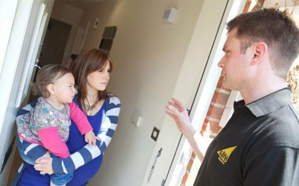 Gas safety engineer carries out gas safety check.