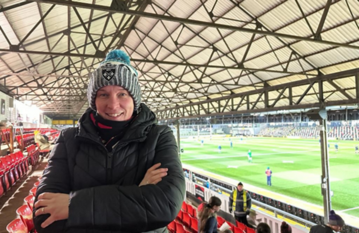 Staff member Fiona, #EmbracingEquity at a Dragon's rugby game